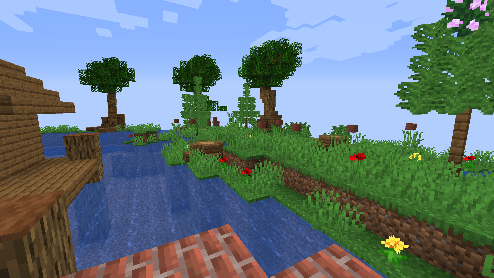 a stream with plants nearby.